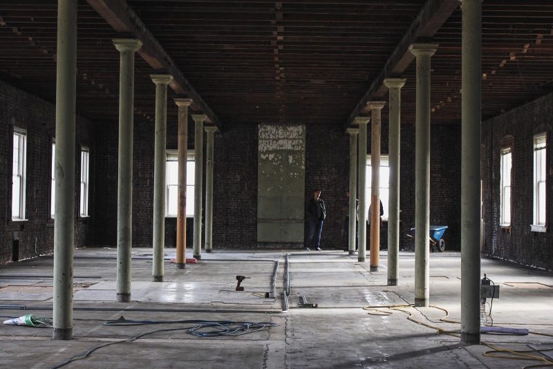 Construction site with green pillars