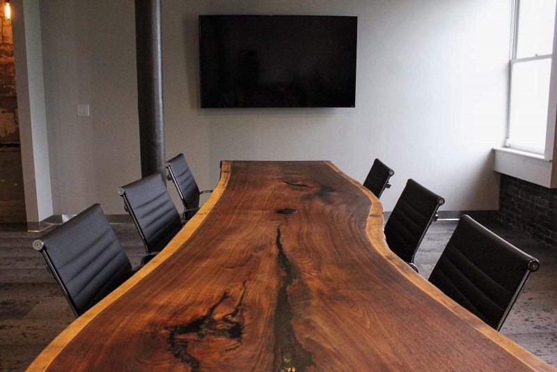 Meeting room with a wood table
