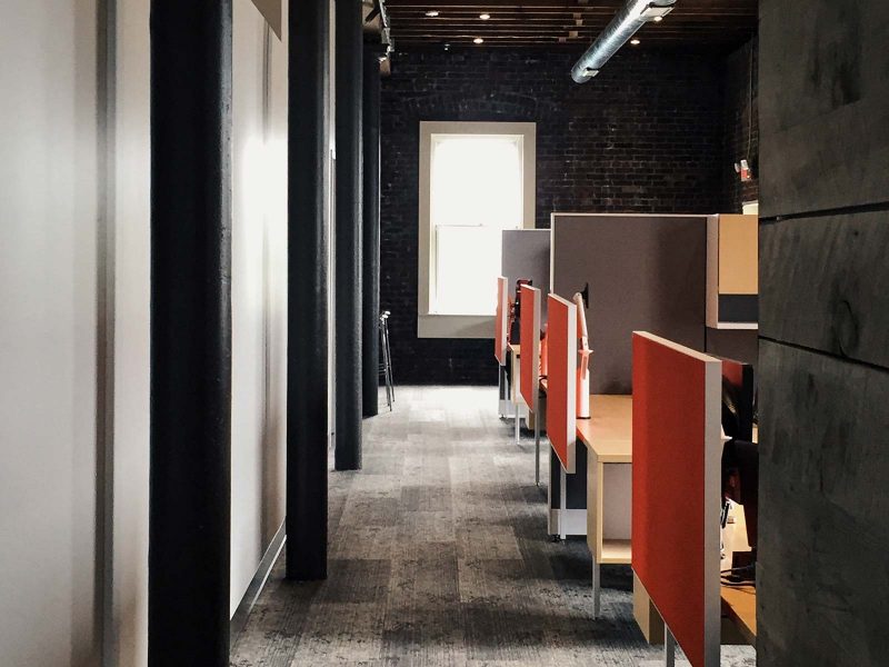 Curran office hallway with cubicles